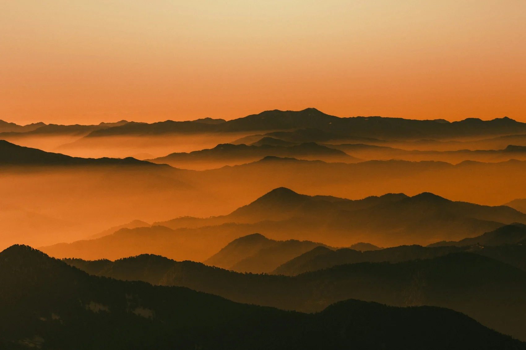 Layered Himalayan hills at sunset in Mussoorie